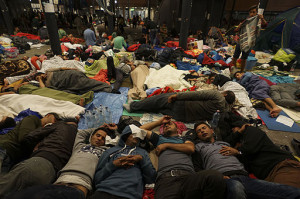 Syrian_refugees_having_rest_at_the_floor_of_Keleti_railway_station._Refugee_crisis._Budapest,_Hungary,_Central_Europe,_5_September_2015