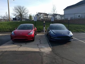 Red_and_Blue_Tesla_Model_3